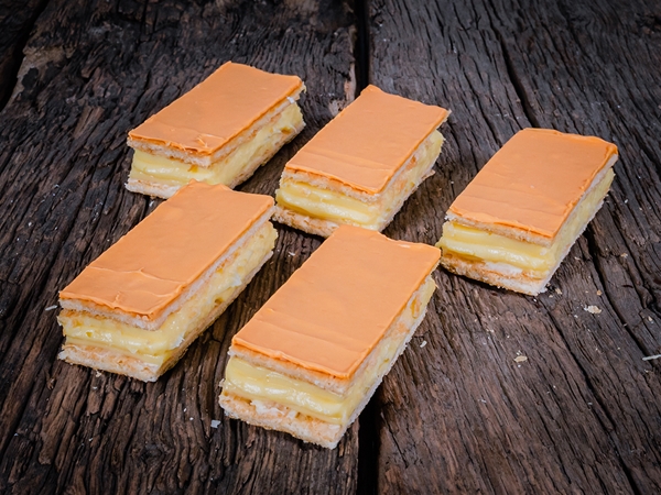 Oranje gele room tompouce per 5