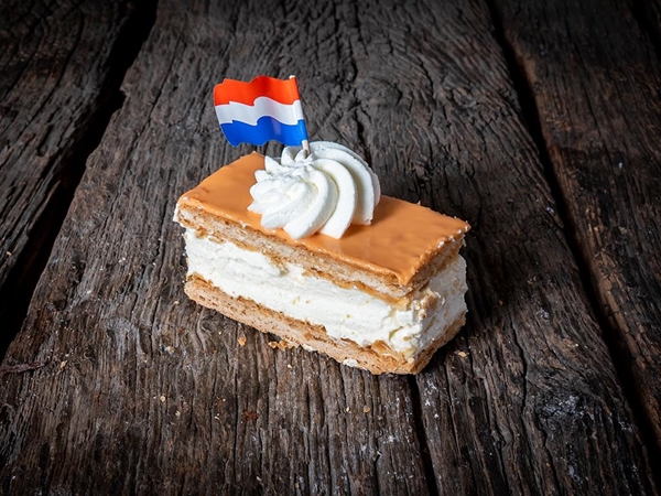 Oranje tompouce gele room per stuk